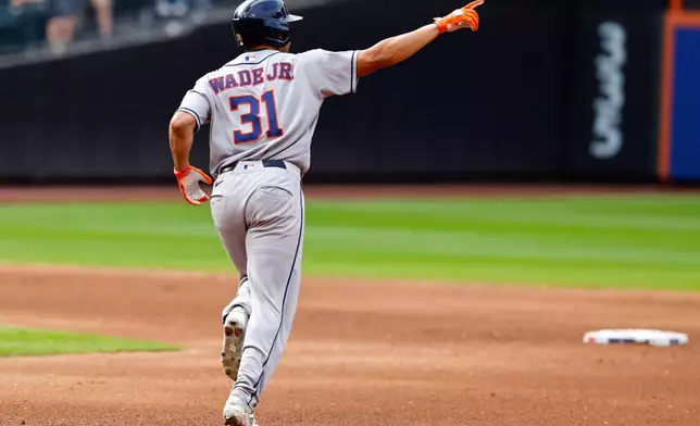 Houston Astros' LaMonte Wade Jr. runs the bases after hitting a home run against the New York Mets during the sixth inning of a baseball game, Sunday, Aug. 30, 2026, in New York. (AP Photo/Noah K. Murray)