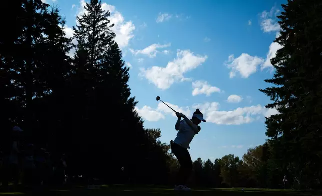Miyu Yamashita, of Japan, hits her tee shot on the 12th hole during the second round at the LPGA Canadian Women's Open golf tournament in Edmonton, Alberta, Friday, Aug. 21, 2026. (Darryl Dyck/The Canadian Press via AP)