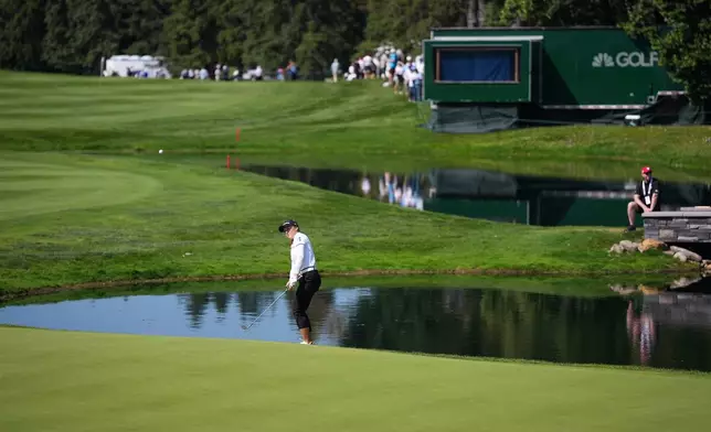 Canada's Brooke Henderson hits her third shot on the ninth hole during the second round at the LPGA Canadian Women's Open golf tournament in Edmonton, Alberta, Friday, Aug. 21, 2026. (Darryl Dyck/The Canadian Press via AP)