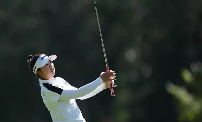 Miyu Yamashita, of Japan, watches her second shot on the 10th hole during the second round at the LPGA Canadian Women's Open golf tournament in Edmonton, Alberta, Friday, Aug. 21, 2026. (Darryl Dyck/The Canadian Press via AP)