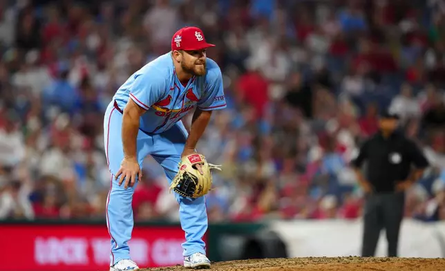 St. Louis Cardinals' Pedro Pagés watches a solo home run hit by Philadelphia Phillies' Kyle Schwarber during the eighth inning of a baseball game, Saturday, Aug. 22, 2026, in Philadelphia. (AP Photo/Derik Hamilton)