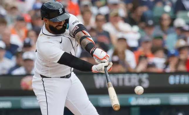 Detroit Tigers' Gleyber Torres singles against the Chicago White Sox during the second inning of a baseball game Sunday, Aug. 16, 2026, in Detroit. (AP Photo/Duane Burleson)