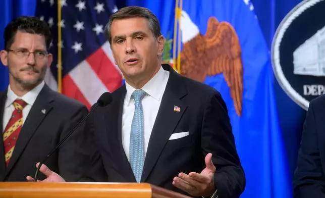 Acting Attorney General Todd Blanche, right, is joined by Deputy Assistant Secretary of the Department of State's Bureau of International Narcotics and Law Enforcement Affairs, Ambassador Michael C. Gonzales, left, during a news conference at the Department of Justice, Wednesday, August 5, 2026 in Washington. (AP Photo/Rod Lamkey, Jr.)