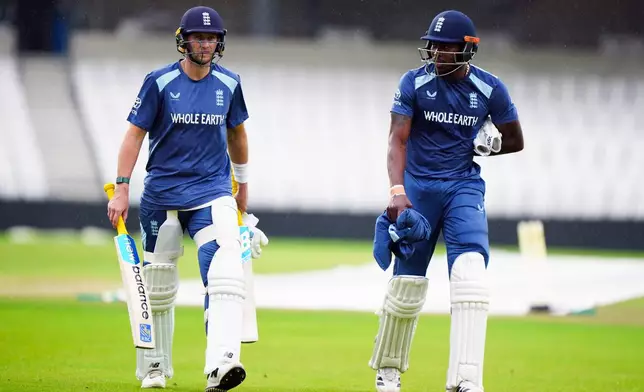 England's Joe Root and Jofra Archer attend a nets session at Headingley, Leeds, England, Monday Aug. 17, 2026, ahead of the 1st Test match against Pakistan on Wednesday. (Bradley Collyer/PA via AP)