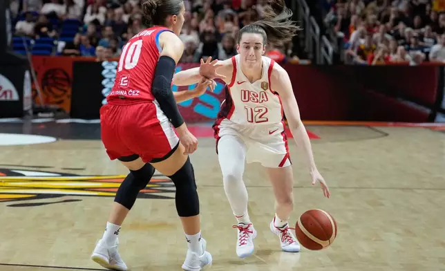 Czechia's Eliska Joklova guards Caitlin Clark, of the United States, during the Women's Basketball World Cup match between the United States and Czechia in Berlin, Monday, Sept. 7, 2026. (AP Photo/Ebrahim Noroozi)