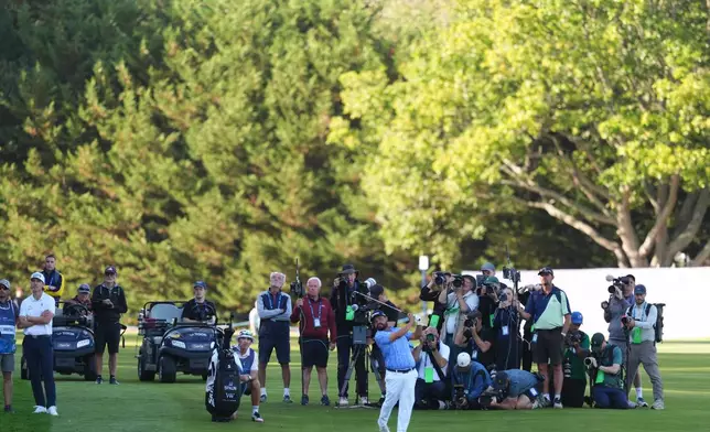 J. J. Spaun of United States plays onto the 18th green on day four of the PGA Championship at Wentworth Golf Club in Virginia Water, England, Sunday Sept. 20, 2026. (Adam Davy/PA via AP)