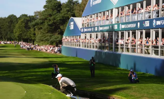 Rory McIlroy of Northern Ireland on the 18th green on day four of the PGA Championship at Wentworth Golf Club in Virginia Water, England, Sunday Sept. 20, 2026. (Adam Davy/PA via AP)