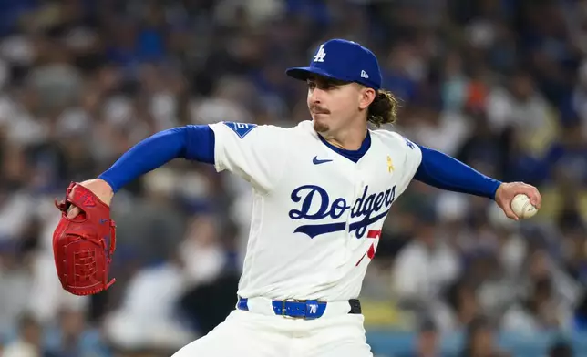 Los Angeles Dodgers pitcher Justin Wrobleski (70) delivers during the first inning of a baseball game against the Washington Nationals in Los Angeles, Sunday, Sept. 6, 2026. (AP Photo/Kyusung Gong)