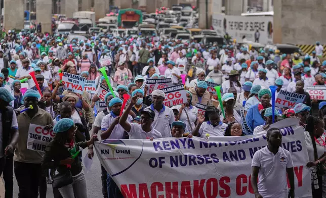 Kenyan nurses and other health workers demonstrate over low pay in Nairobi, Kenya Tuesday, Sept. 8, 2026. (AP Photo/Brian Inganga)