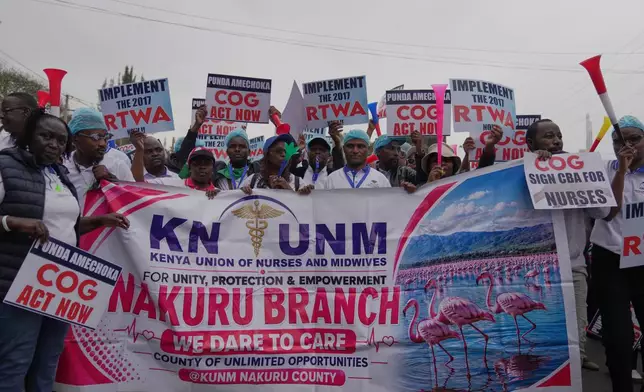 Kenyan nurses and other health workers demonstrate over low pay in Nairobi, Kenya Tuesday, Sept. 8, 2026. (AP Photo/Brian Inganga)