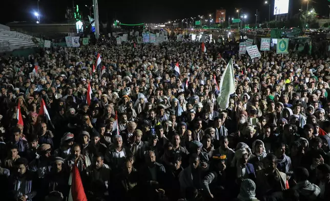 Supporters of Yemen's Houthi rebels gather during a rally organized to celebrate the group's capture of Mayun Island in the strategic Bab el-Mandeb Strait, in Houthi-controlled Sanaa, Yemen, Friday, Sept. 11, 2026. (AP Photo/Osamah Abdulrahman)