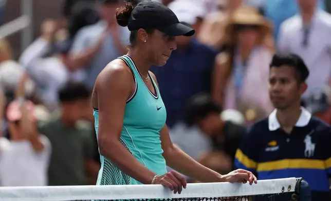Madison Keys, of the United States, reacts after she lost her match to Zheng Qinwen, of China, during the third round of the U.S. Open tennis championships Saturday, Sept. 5, 2026, in New York. (AP Photo/Heather Khalifa)