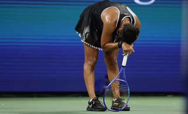 Naomi Osaka, of Japan, celebrates after defeating Elise Mertens, of Belgium, in three sets during the third round of the U.S. Open tennis championships, Saturday, Sept. 5, 2026, in New York. (AP Photo/Adam Hunger)