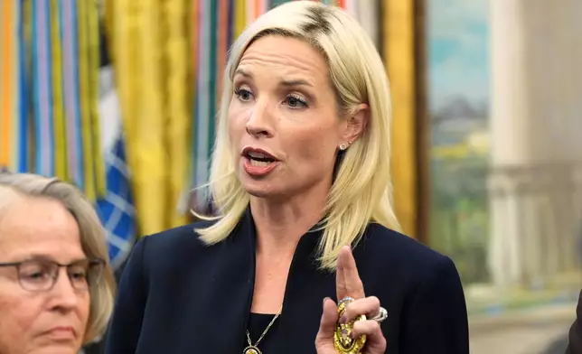 Rep. Ashley Hinson, R-Iowa, speaks in the Oval Office of the White House, Monday, Sept. 28, 2026, in Washington. (AP Photo/Alex Brandon)