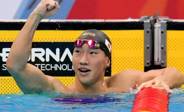 Shin Ohashi of Japan celebrates after winning the men's 200-meter breaststroke final in swimming at the Asian Games in Tokyo, Japan, Thursday, Sept. 24, 2026. (AP Photo/Hiro Komae)