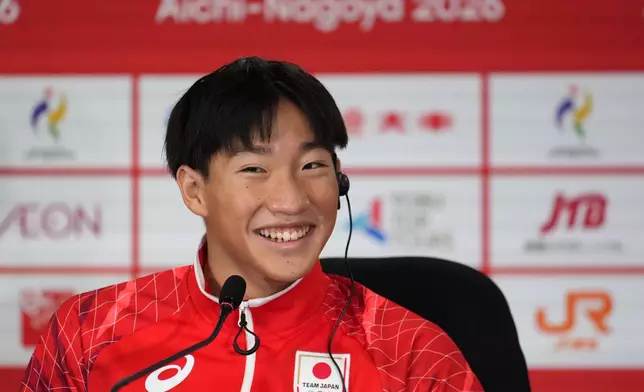 Shin Ohashi of Japan speaks during a press conference as he set a world record in the men's 200-meter breaststroke in swimming at the Asian Games in Tokyo, Japan, Thursday, Sept. 24, 2026. (AP Photo/Hiro Komae)