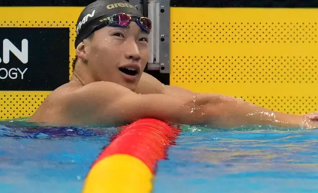 Shin Ohashi of Japan celebrates after winning the men's 200-meter breaststroke final in swimming at the Asian Games in Tokyo, Japan, Thursday, Sept. 24, 2026. (AP Photo/Hiro Komae)