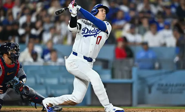 Los Angeles Dodgers' Shohei Ohtani (17) strikes out during the sixth inning of a baseball game against the St. Louis Cardinals, Wednesday, Sept. 2, 2026, in Los Angeles. (AP Photo/William Liang)