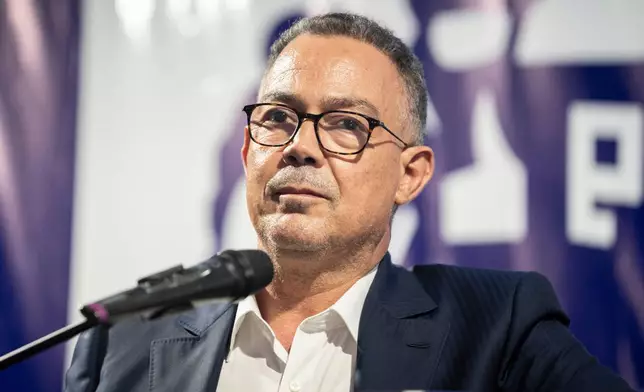 Faouzi Lekjaa, president of the Royal Moroccan Football Federation and member of the political bureau of the Authenticity and Modernity Party (PAM) takes part in an electoral rally ahead of the upcoming legislative elections, in Benslimane, Morocco, Sunday, Sept. 20, 2026. (AP Photo/Mosa'ab Elshamy)
