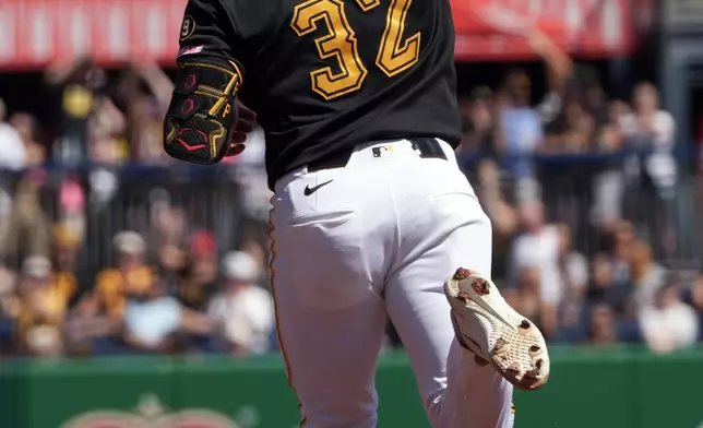 Pittsburgh Pirates' Henry Davis celebrates as he rounds the bases on his home run off Los Angeles Angels pitcher Walbert Ureña during the third inning of a baseball game in Pittsburgh, Sunday, Sept. 6, 2026. (AP Photo/Tom E. Puskar)