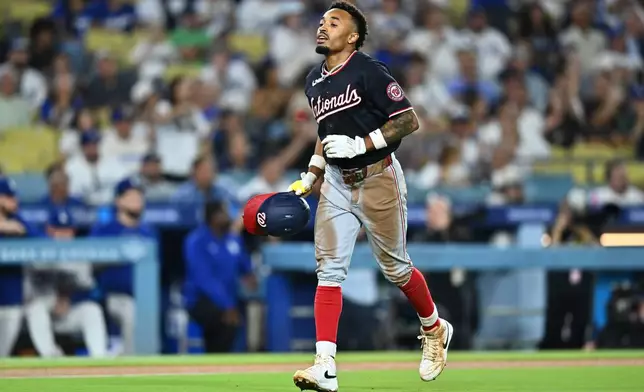 Washington Nationals' Nasim Nuñez runs back to the dugout after being caught stealing during the third inning of a baseball game against the Los Angeles Dodgers, Friday, Sept. 4, 2026, in Los Angeles. (AP Photo/William Liang)
