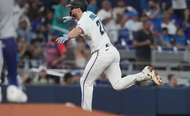 Miami Marlins' Graham Pauley runs the bases after hitting a two run home run during the second inning of a baseball game against the Los Angeles Dodgers, Saturday, Sept. 12, 2026, in Miami. (AP Photo/Lynne Sladky)