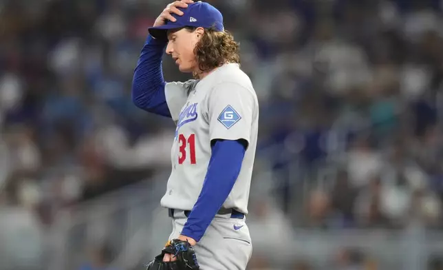 Los Angeles Dodgers starting pitcher Tyler Glasnow (31) stands on the mound with the bases loaded during the first inning of a baseball game against the Miami Marlins, Saturday, Sept. 12, 2026, in Miami. (AP Photo/Lynne Sladky)