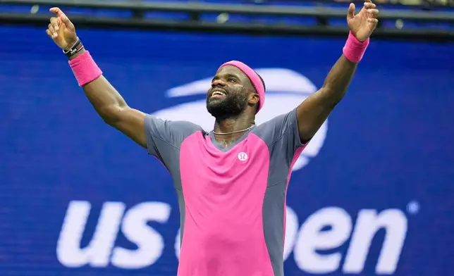 Frances Tiafoe, of the United States, celebrates winning a match against Alex Michelsen, of the United States, during the quarterfinal round of the U.S. Open tennis championships, Tuesday, Sept. 8, 2026, in New York. (AP Photo/Seth Wenig)