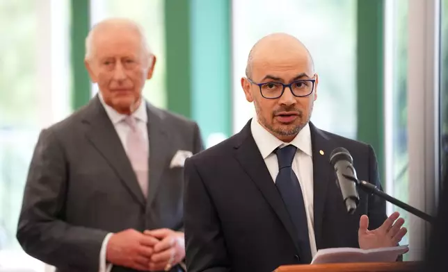 Sir Demis Hassabis gives a speech during a meeting hosted by Britain's King Charles III, background, for leaders from the artificial intelligence (AI) sector, Government, and thought leaders to discuss how AI can be developed and deployed in ways that benefit society, at Dumfries House in Cumnock, Scotland, Thursday Sept. 17, 2026. (Jonathan Brady/PA via AP, Pool)