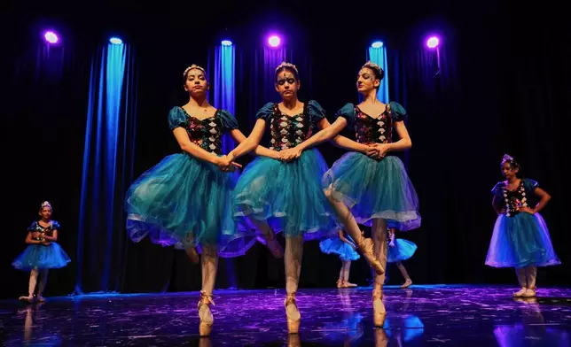 Students from the Baghdad Ballet Academy perform in a production titled "Mermaid" at Al-Sinbad Theater in Baghdad, Iraq, Friday, Sept. 25, 2026. (AP Photo/Hadi Mizban)
