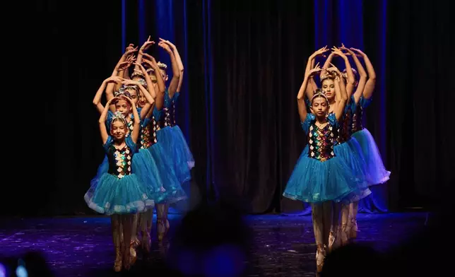 Dancers from Baghdad Ballet Academy perform in a production titled "Mermaid" at Al-Sinbad Theater in Baghdad, Iraq, Friday, Sept. 25, 2026. (AP Photo/Hadi Mizban)