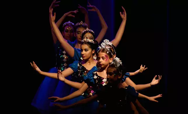 Dancers from Baghdad Ballet Academy perform in a production titled "Mermaid" at Al-Sinbad Theater in Baghdad, Iraq, Friday, Sept. 25, 2026. (AP Photo/Hadi Mizban)