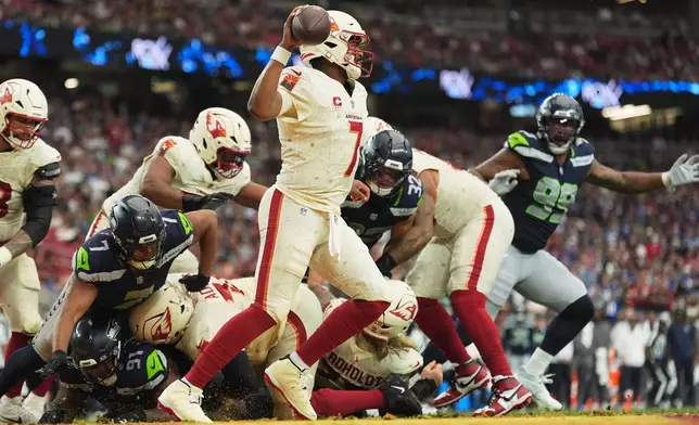 Arizona Cardinals quarterback Jacoby Brissett looks to throw against the Seattle Seahawks during the first half of an NFL football game in Glendale, Ariz., Sunday, Sept. 20, 2026. (AP Photo/Ross D. Franklin)