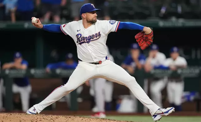 Texas Rangers pitcher Nathan Eovaldi throws to the Boston Red Sox in the ninth inning of a baseball game Wednesday, Sept. 16, 2026, in Arlington, Texas. (AP Photo/Tony Gutierrez)