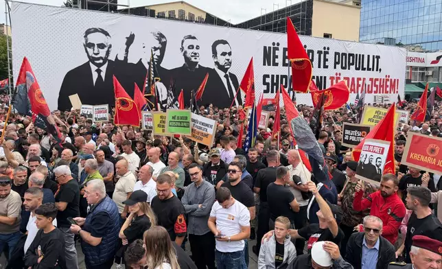 People rally in Pristina, Kosovo, Saturday, Sept. 12, 2026, in support of the former president Hashim Thaci and the other defendants, Kadri Veseli, Rexhep Selimi and Jakup Krasniqi ahead of their verdicts next week at a Netherlands-based court which tried them for alleged war crimes during a 1998-1999 separatist war from Serbia. (AP Photo/Zana Cimili)