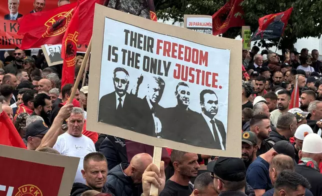 People rally in Pristina, Kosovo, Saturday, Sept. 12, 2026, in support of the former president Hashim Thaci and the other defendants, Kadri Veseli, Rexhep Selimi and Jakup Krasniqi ahead of their verdicts next week at a Netherlands-based court which tried them for alleged war crimes during a 1998-1999 separatist war from Serbia. (AP Photo/Zana Cimili)