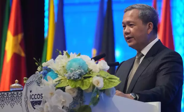 Cambodian Prime Minister Hun Manet delivers a speech during the opening an international conference on combating online scams in Phnom Penh, Cambodia, Wednesday, Sept. 23, 2026. (AP Photo/Heng Sinith)