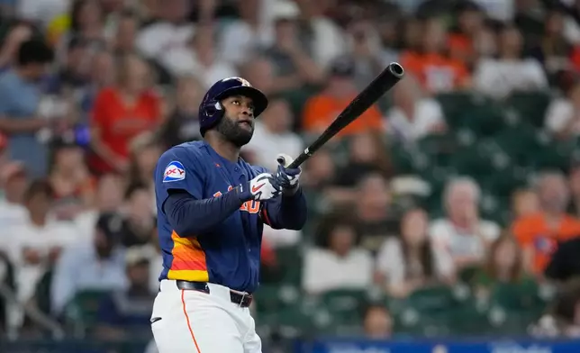 Houston Astros' Yordan Alvarez hits a home run against the Arizona Diamondbacks during the first inning of a baseball game Sunday, Sept. 6, 2026, in Houston. (AP Photo/David J. Phillip)