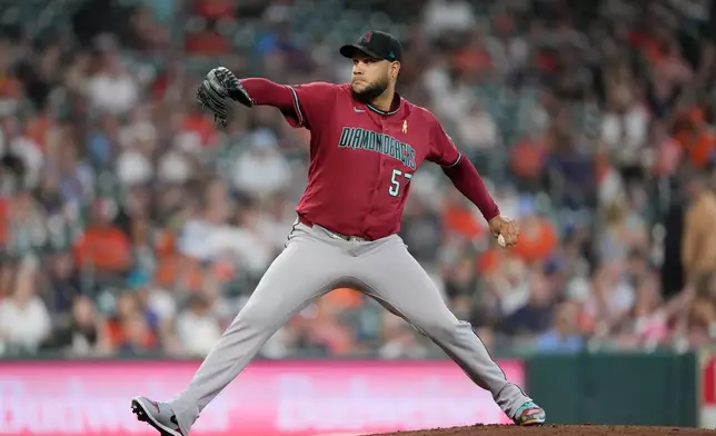 Arizona Diamondbacks starting pitcher Eduardo Rodriguez throws against the Houston Astros during the first inning of a baseball game Sunday, Sept. 6, 2026, in Houston. (AP Photo/David J. Phillip)