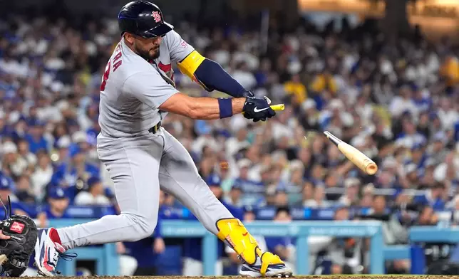 St. Louis Cardinals' Iván Herrera breaks his bat as he grounds out during the seventh inning of a baseball game against the Los Angeles Dodgers, Thursday, Sept. 3, 2026, in Los Angeles. (AP Photo/Mark J. Terrill)