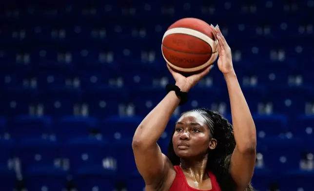 Kiki Iriafen (9) of United States practices during a training session ahead of the match between China and United States during the Women's Basketball World Cup in Berlin, Germany, Wednesday, Sept. 2, 2026. (AP Photo/Ebrahim Noroozi)