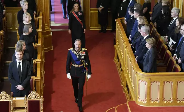 King Haakon VIII., front, arrives to take the oath according to the Constitution in the Storting, Norway's parliament, in Oslo, Norway, Tuesday, Sept. 1, 2026. (Ole Berg-Rusten/Pool Photo via AP)
