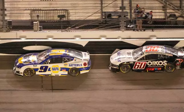 Chase Elliott (9) leads Ryan Preece (60) through the front stretch at the half way point of a NASCAR Cup Series auto race at Daytona International Speedway, Saturday, Aug. 29, 2026, in Daytona Beach, Fla. (AP Photo/John Raoux)