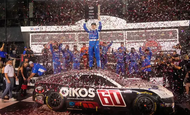 Ryan Preece, center, celebrates after winning a NASCAR Cup Series auto race at Daytona International Speedway, Saturday, Aug. 29, 2026, in Daytona Beach, Fla. (AP Photo/John Raoux)