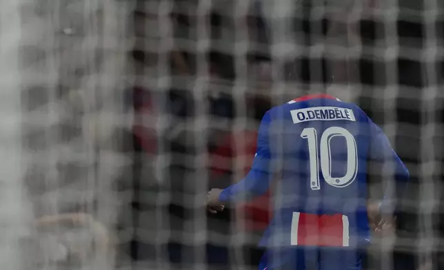PSG's Ousmane Dembele celebrates after scoring the opening goal during the Champions League opening phase soccer match between PSG and Slovan Bratislava in Paris, Wednesday, Sept. 9, 2026. (AP Photo/Thibault Camus)