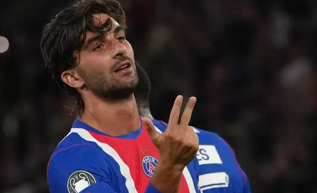 PSG's Ferran Torres celebrates after scoring his third goal during the Champions League opening phase soccer match between PSG and Slovan Bratislava in Paris, Wednesday, Sept. 9, 2026. (AP Photo/Thibault Camus)