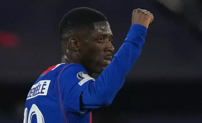 PSG's Ousmane Dembele celebrates after scoring during the Champions League opening phase soccer match between PSG and Slovan Bratislava in Paris, Wednesday, Sept. 9, 2026. (AP Photo/Thibault Camus)