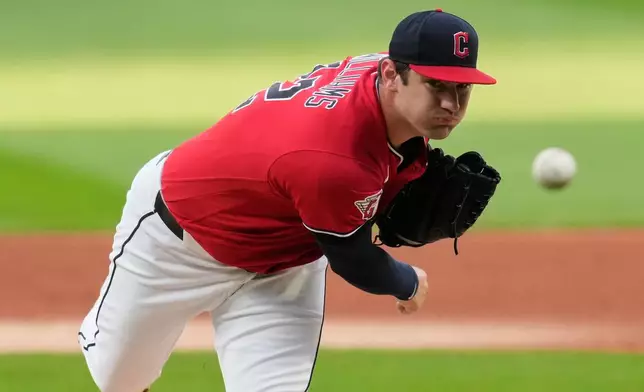 Cleveland Guardians' Gavin Williams pitches in the first inning of a baseball game against the Chicago White Sox in Cleveland, Monday, Sept. 14, 2026. (AP Photo/Sue Ogrocki)