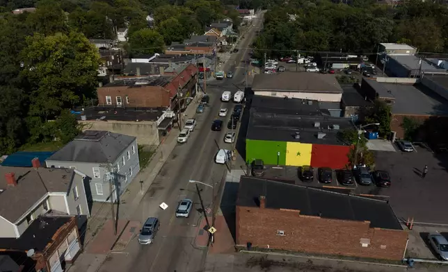 The national flag of Senegal is painted on the side of the Touba Tedoungal African restaurant, Thursday, Sept. 3, 2026, in Lockland, Ohio. (AP Photo/Carolyn Kaster)