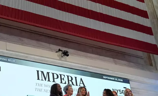 First lady Melania Trump, third from left, rings the opening bell at the New York Stock Exchange Wednesday, Sept. 23, 2026, in New York. (AP Photo/Seth Wenig)